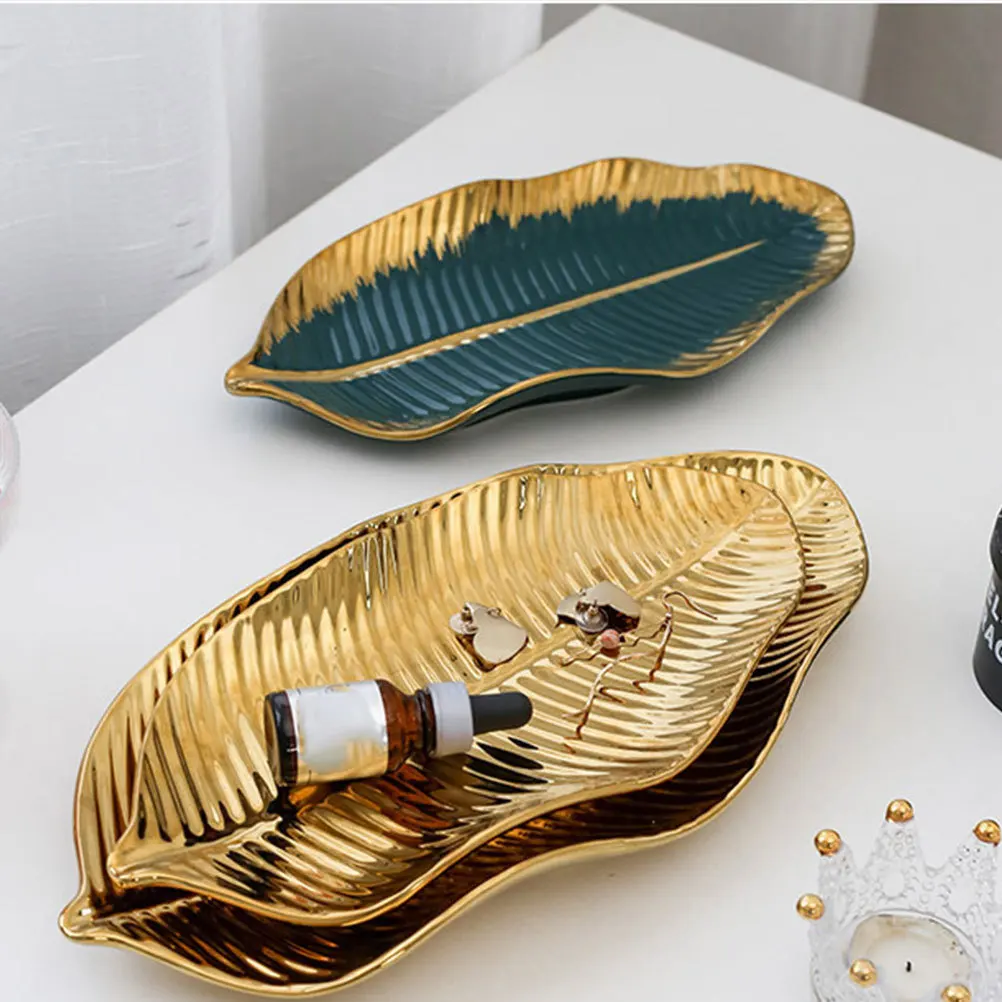 

1 шт., керамический поднос в форме листа с золотым краем, декоративная тарелка для хранения, декор для рабочего стола, фрукты, десерт, витрина, тарелка для ювелирных изделий