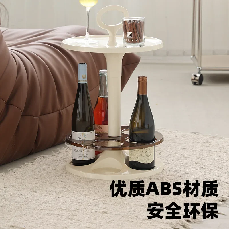 The sofa side table is simple, the wine glass holder is small