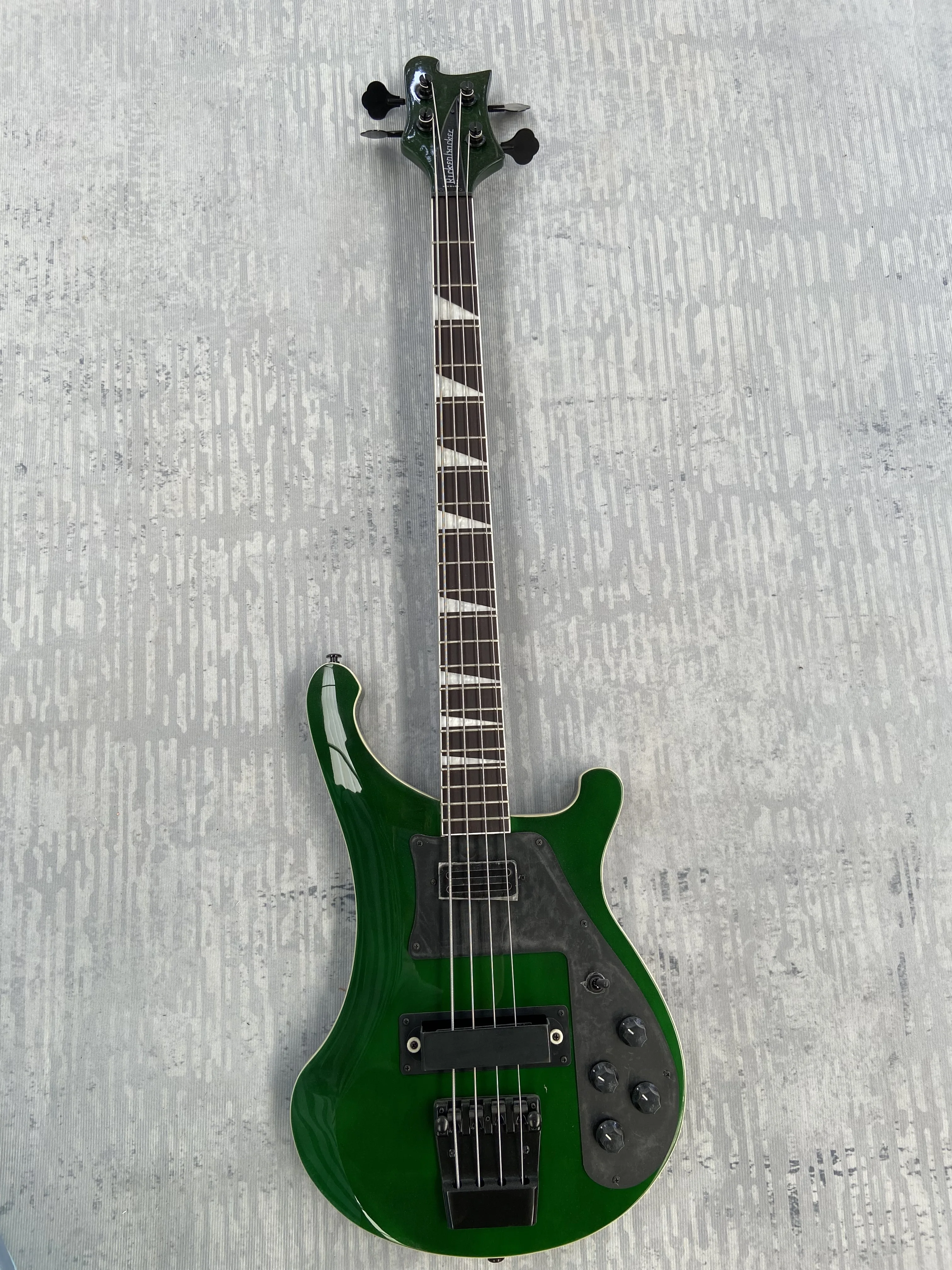 Rickenbacker 4003 bass, mahogany body, 4 string, have logo. Made in China, green transparent