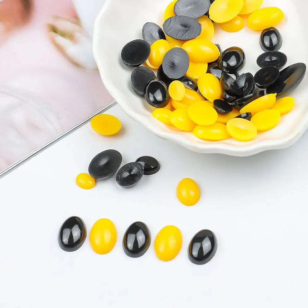 จมูกแบนปลอดภัยสำหรับตุ๊กตา 100 ชิ้น จมูกแบนพลาสติกทรงรีสำหรับตุ๊กตา สีดำ/เหลือง ตาพลาสติกปลอดภัย