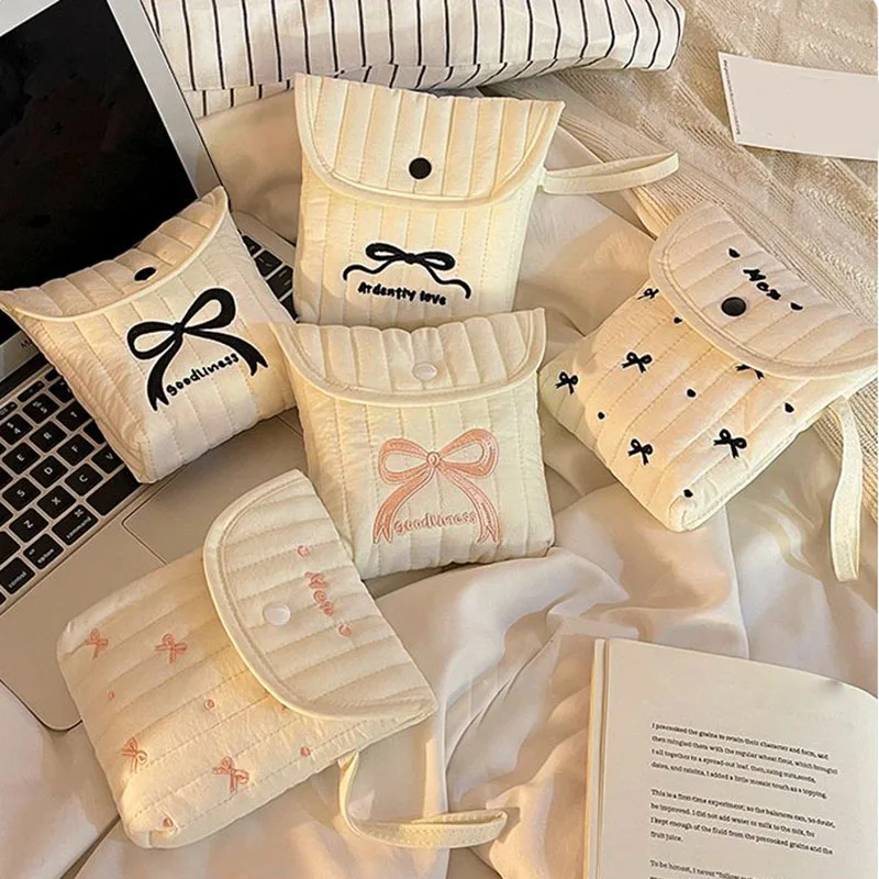Nette Stickerei Bogen Damenbinden Menstruation Handtuch Lagerung Tasche Tragbare Mini Student Frauen Tampon Monatliche Tasche Lagerung Taschen