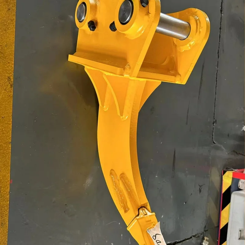 

Soil Loosening Attachment For Excavators Used In Land Preparation And Ground Leveling, Featuring A Durable Handle Design