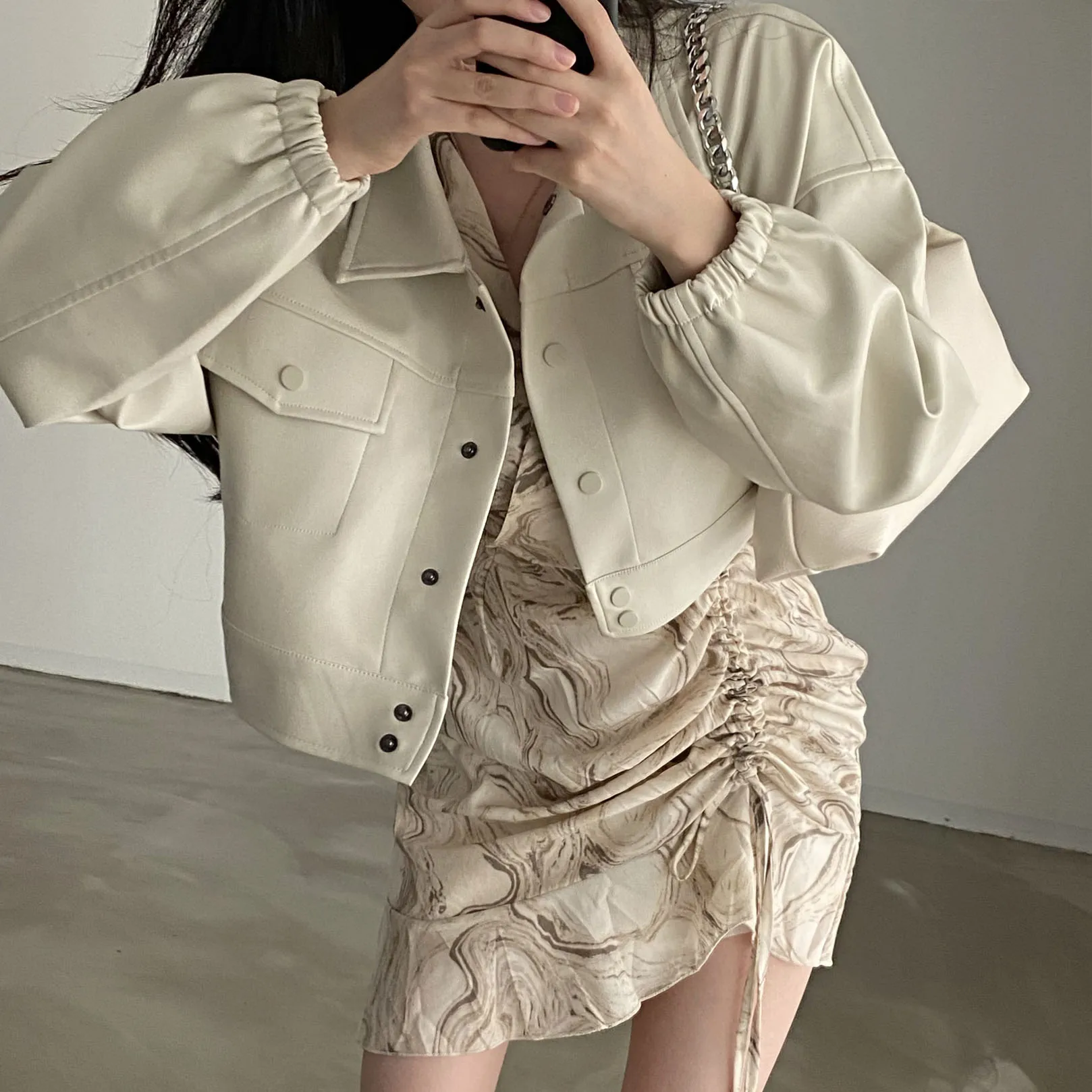 Short PU Leather Jacket with Stand Collar Button Shoulder Elastic Sleeve Pocket Design Women's Loose Fit Long Sleeve Coat