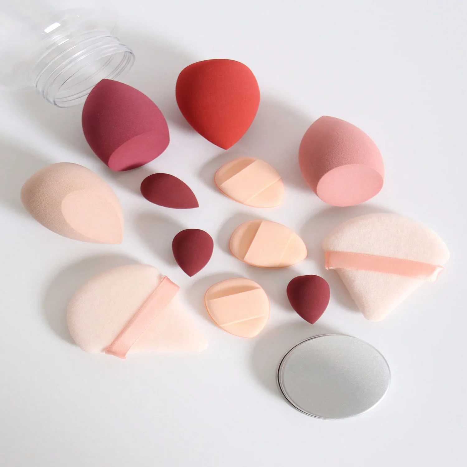 Makeup Sponge 12pcs/set. Includes 2 Triangle Loose Powder Puffs, 4 Beauty Eggs, 3 Mini Beauty Eggs, 3 Mini Finger Air Cushion Pu