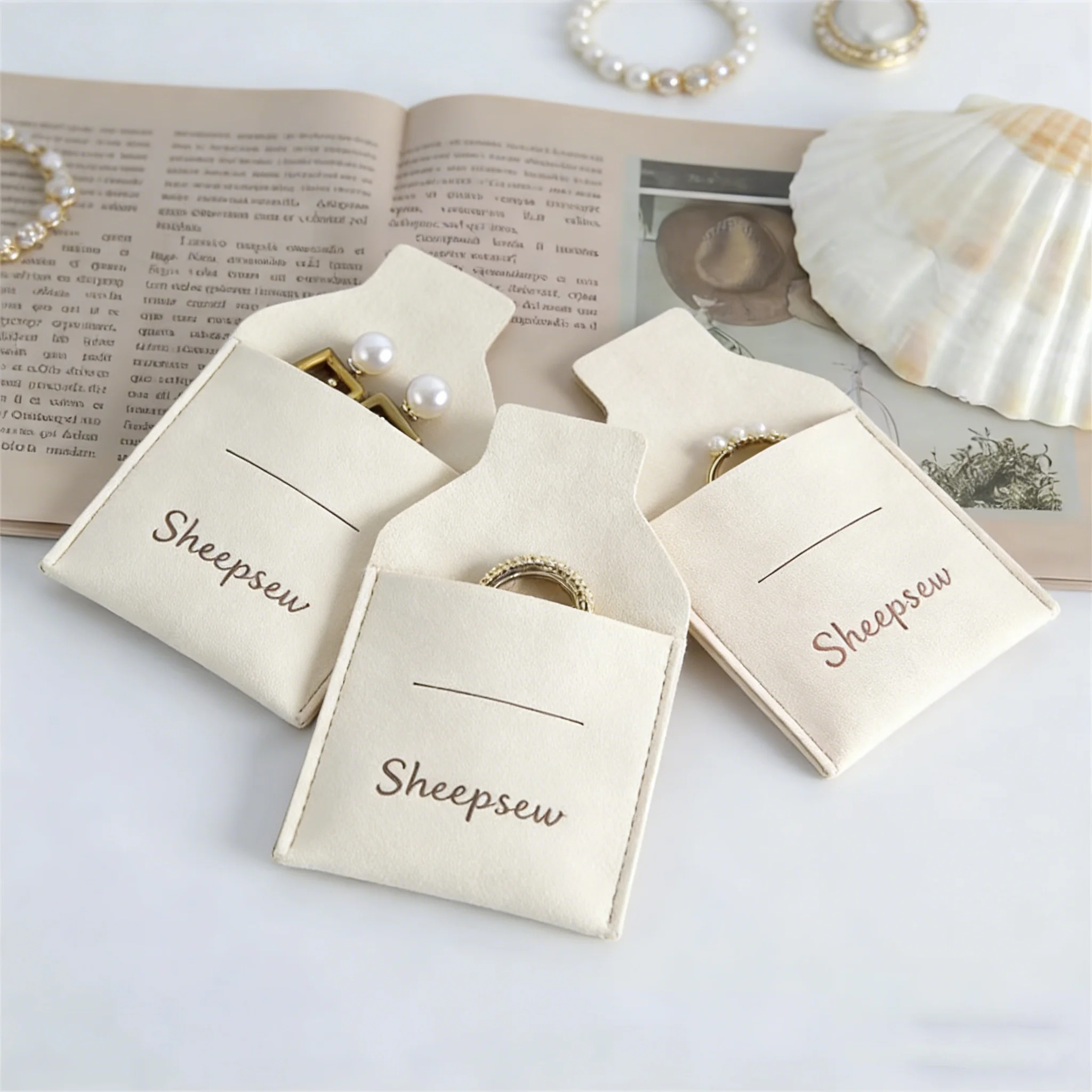 

100-Pack Luxury Thick Microfiber Ring Necklace Earrings Gift Packaging Jewelry Pouch Deboss Custom Logo Suede Flap Envelope Bag