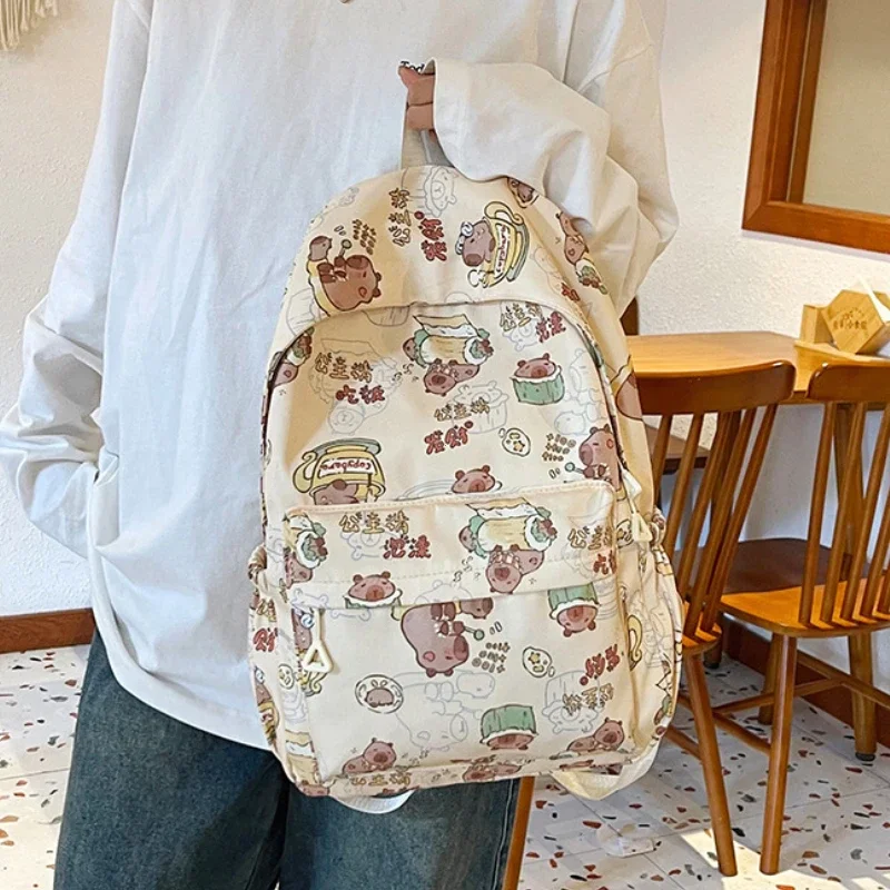 2025 nova mochila de náilon à prova dwaterproof água das mulheres saco escolar portátil grande capacidade volta anime sacos de bagagem kawaii