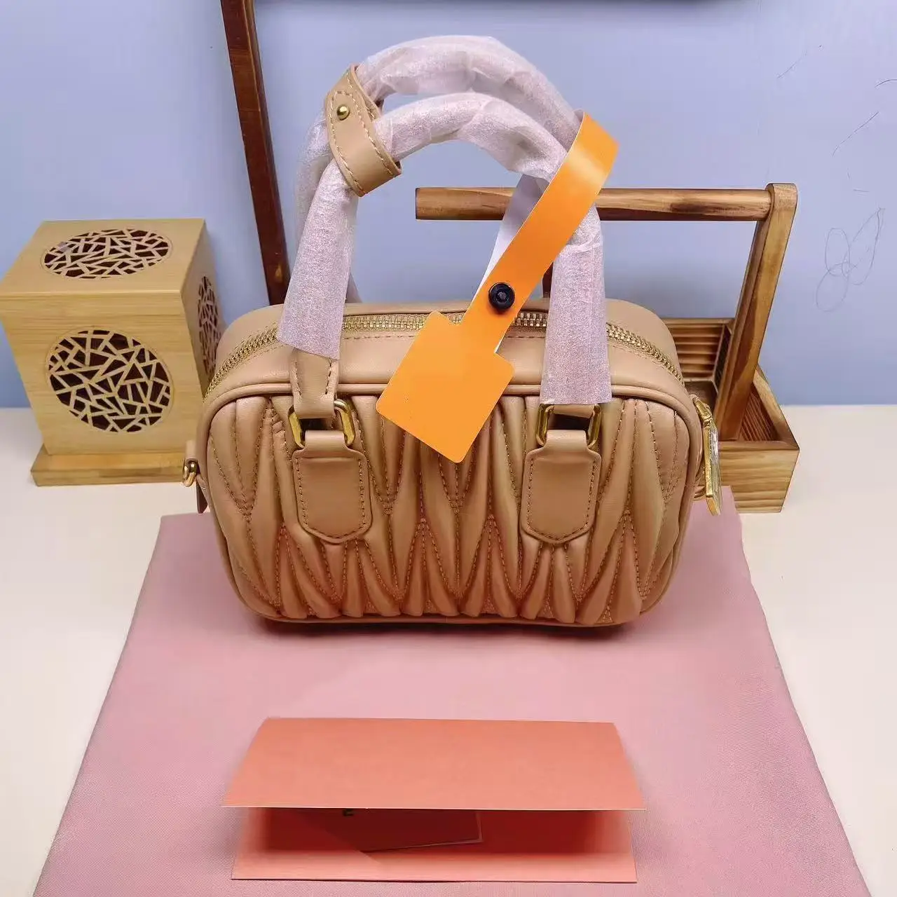 

New real leather women's bag 2025 fashion Joker pleated Boston trumpet bowling darling daughter clutch shoulder messenger bags