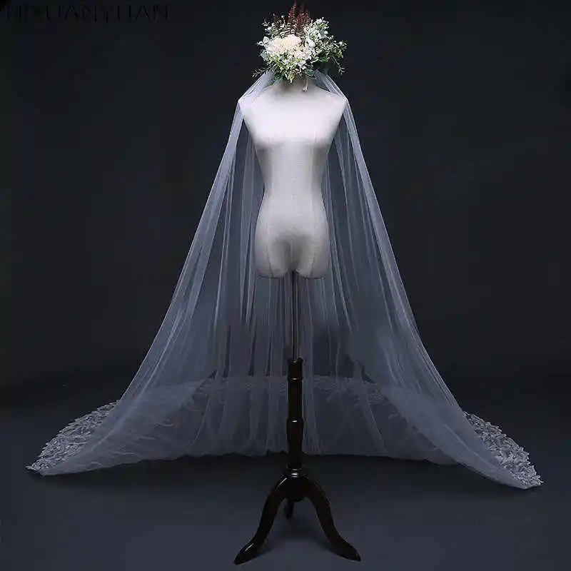 Veli da sposa eleganti Donna Applicazioni monostrato Perline con paillettes Bordo in pizzo Abito da sposa in tulle Velo De Novia Personalizzato