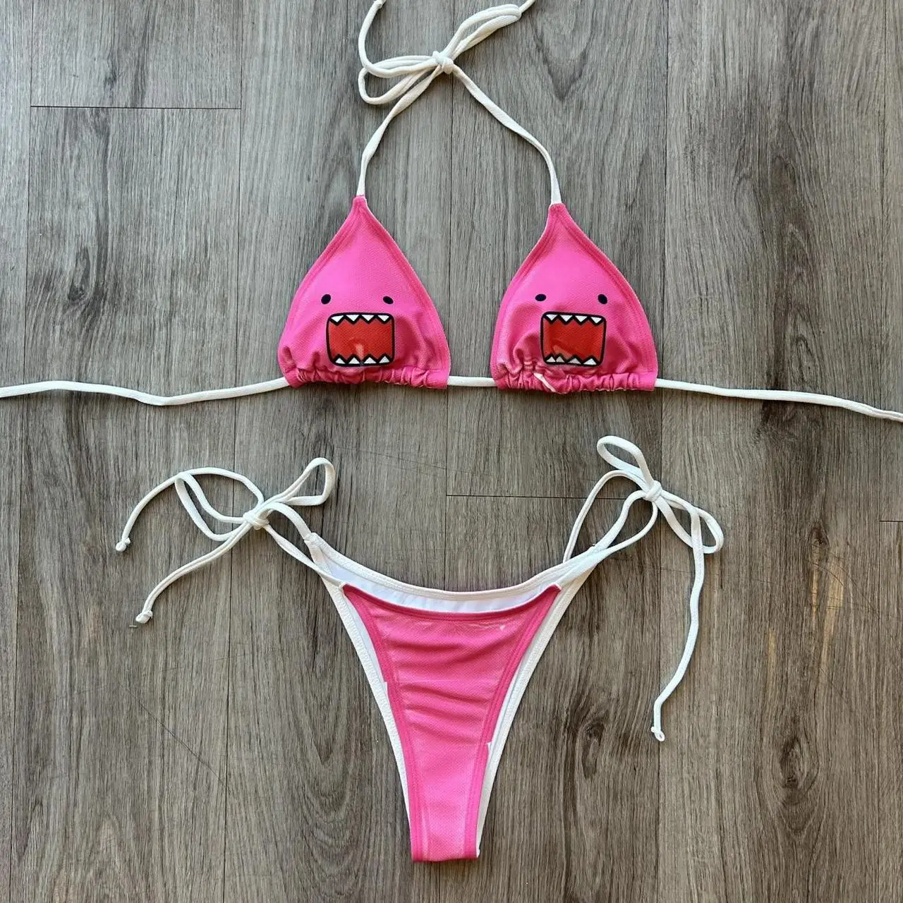 

2026 New Arrival Women Y2K Pink Cartoon Monster Print Halter Triangle Top Tie Side Thong Bikini Swimsuit
