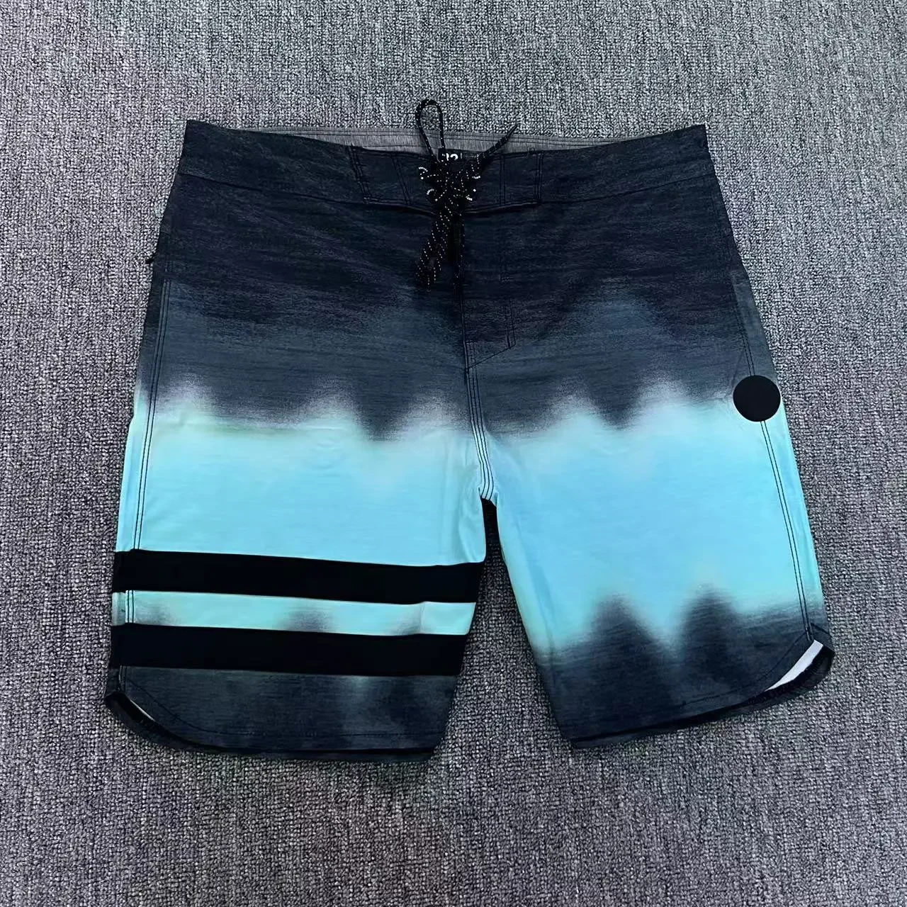 Pantaloncini da spiaggia da surf professionali da uomo Bermuda in vita regolabile Pantaloncini da surf elasticizzati a 4 vie impermeabili Pantaloncini da surf ad asciugatura rapida