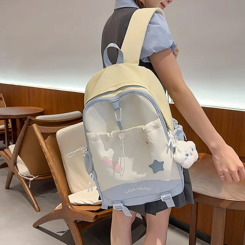 Picture 4: Waterproof nylon color-blocking student schoolbag, cute star-shaped large-capacity computer storage travel backpack