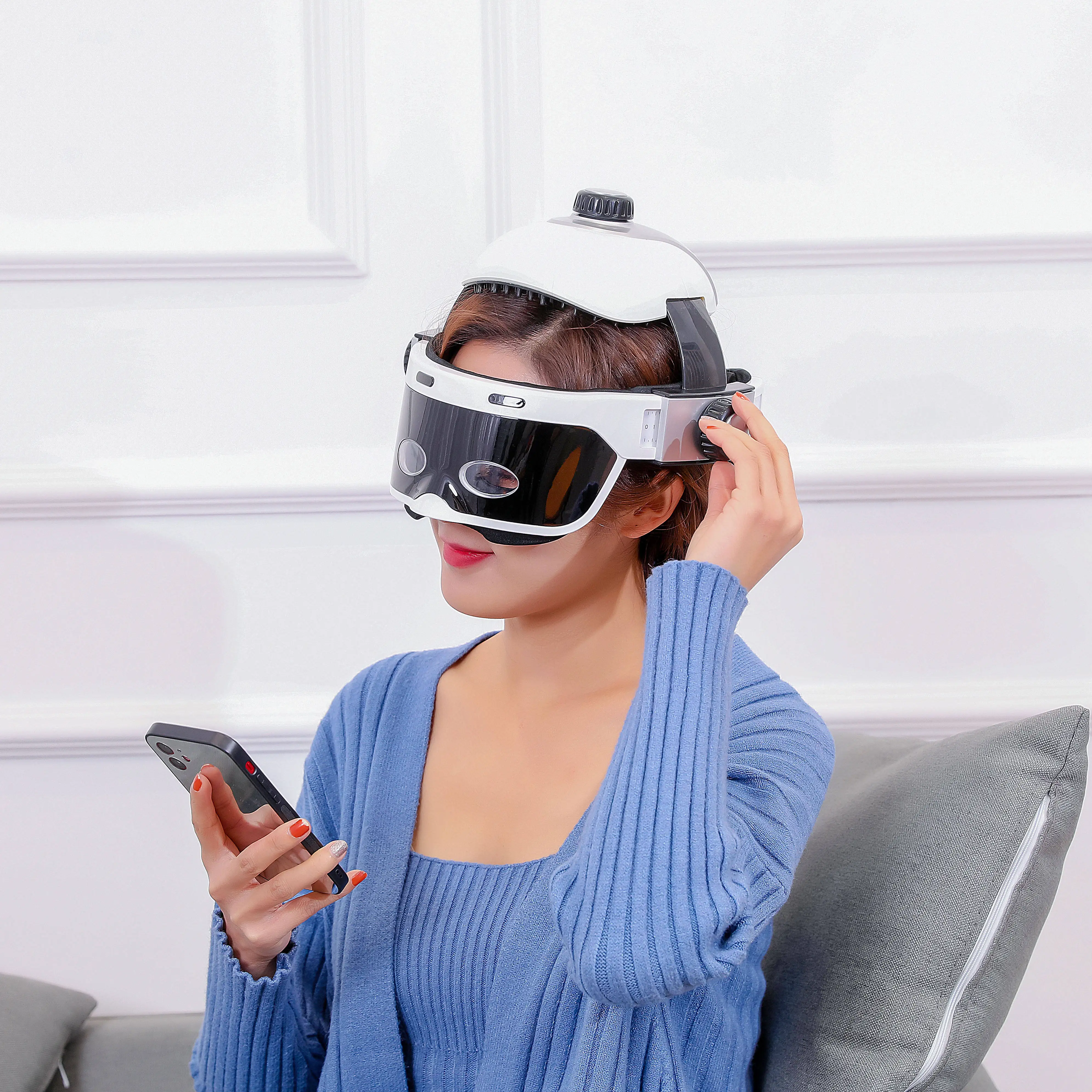 Wholesale ABS Material CE Certified Automatic Vibrating Eye Head Massage Helmet Bluetooth Control Adjustable Intensity Massager