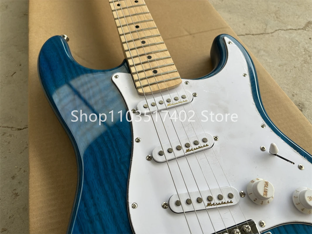 Factory clear blue 6-string electric guitar maple neck, ash body, chrome hardware