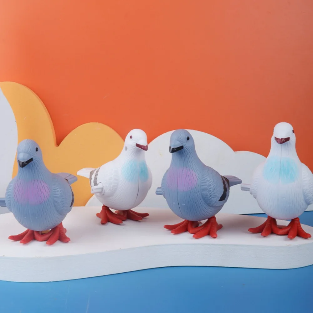 1PC Plastic Clockwork Jumping Pigeon Toys Cute Wind Up Simulation Bird Animals Jumped Walking for Kid Boy Girl Gift Home Decor