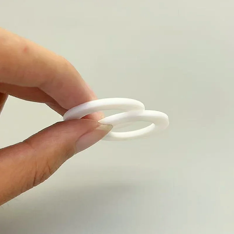 جوانات PTFE عالية الجودة CS 2 مم بيضاء عازلة رائعة مقاومة للأحماض/الكاليس غير لاصقة سهلة التركيب والتفكيك