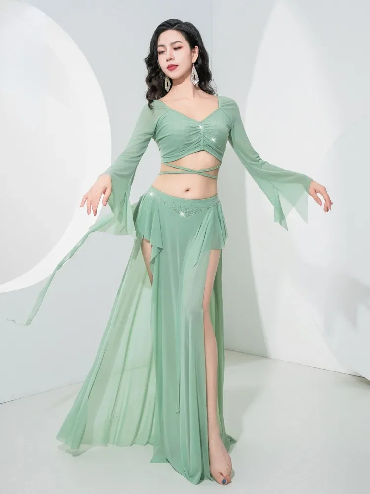 

Adult Woman Sexy Belly Dance Costume 2024New Long sleeved Practice Dress Immortal Qi Lotus Leaf Ribbon Team Performance Clothing