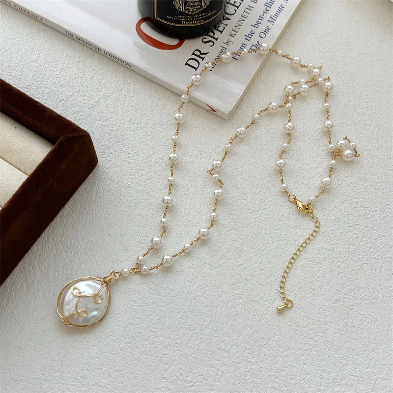 

Luxury Pearl Necklace with Big Natural Baroque pearl pendant, women's handmade long sweater chain, niche long necklace