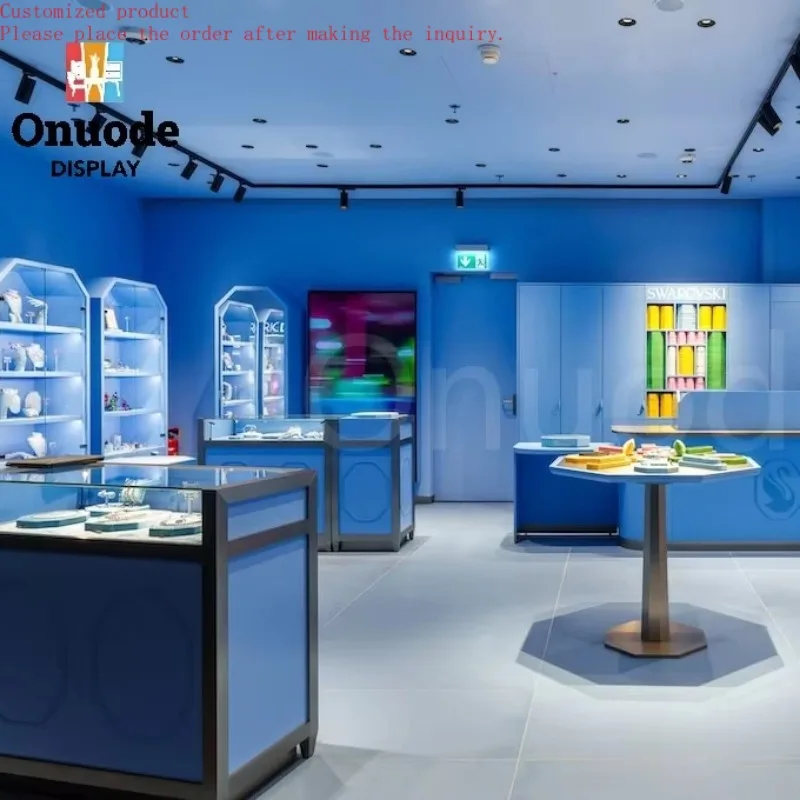 

Роскошная витрина для ювелирных изделий на заказ. Светодиодные стеклянные шкафы для элегантных розничных интерьеров. Дизайн интерьера ювелирного магазина.