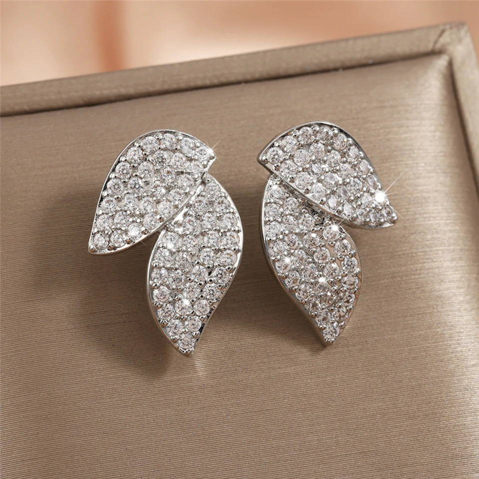 ZAKOL Luxury Buling Micro Paved Zirconia Leaf Earring dla kobiet Wykwintna biżuteria ślubna z białymi kryształami Estetyczna biżuteria ślubna