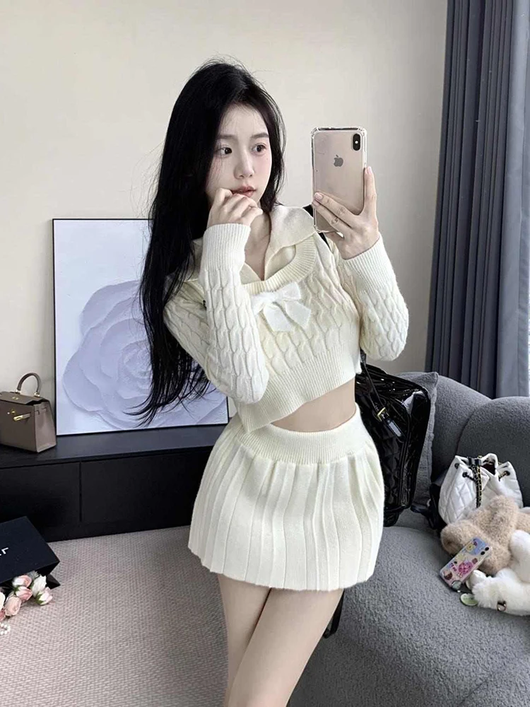 

Колледжный стиль, осенне-зимний новый короткий вязаный топ с бантом, сексуальная юбка с высокой талией, короткая юбка, комплект из двух предметов