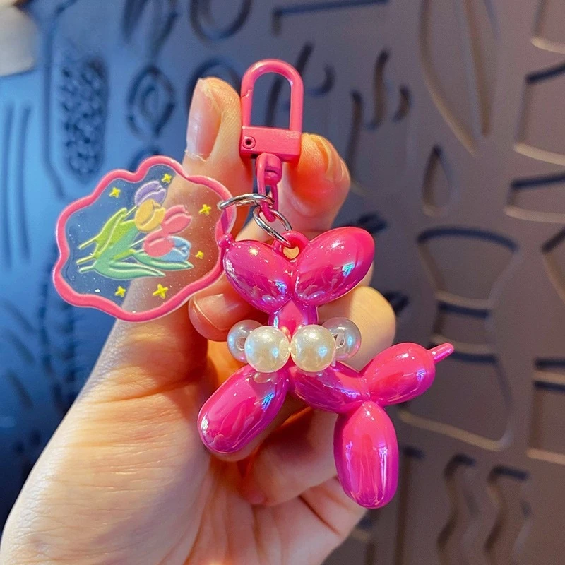 Balloon Puppy Keychain, electroplated iridescent finish, with pearl ring accent