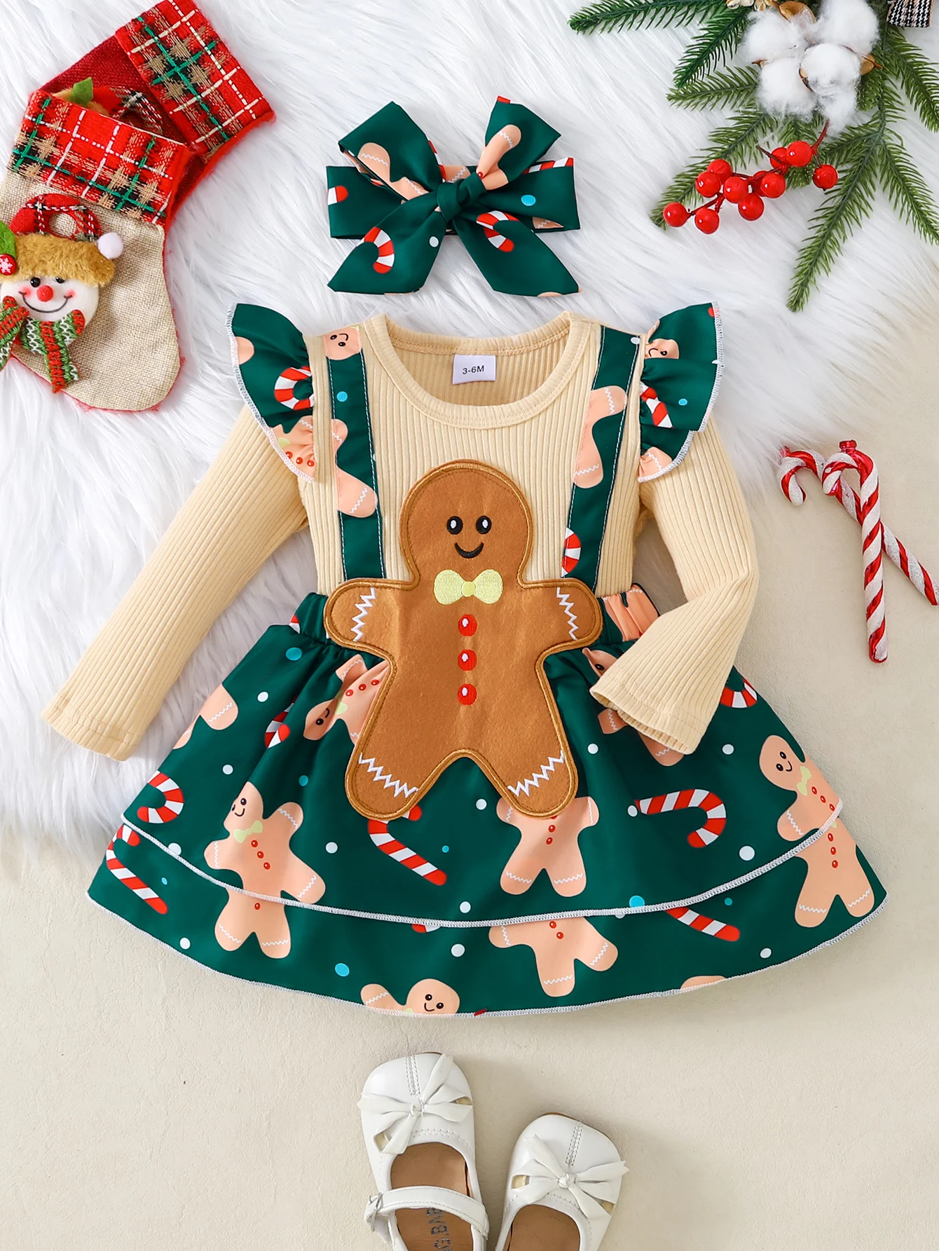 Lebkuchenmädchen-Outfit-Set mit Weihnachtsmotiv, mit Spitzenärmeln, bedruckten Overalls mit Innenmatch und großer Schleifendekoration für Babys – Detail 1