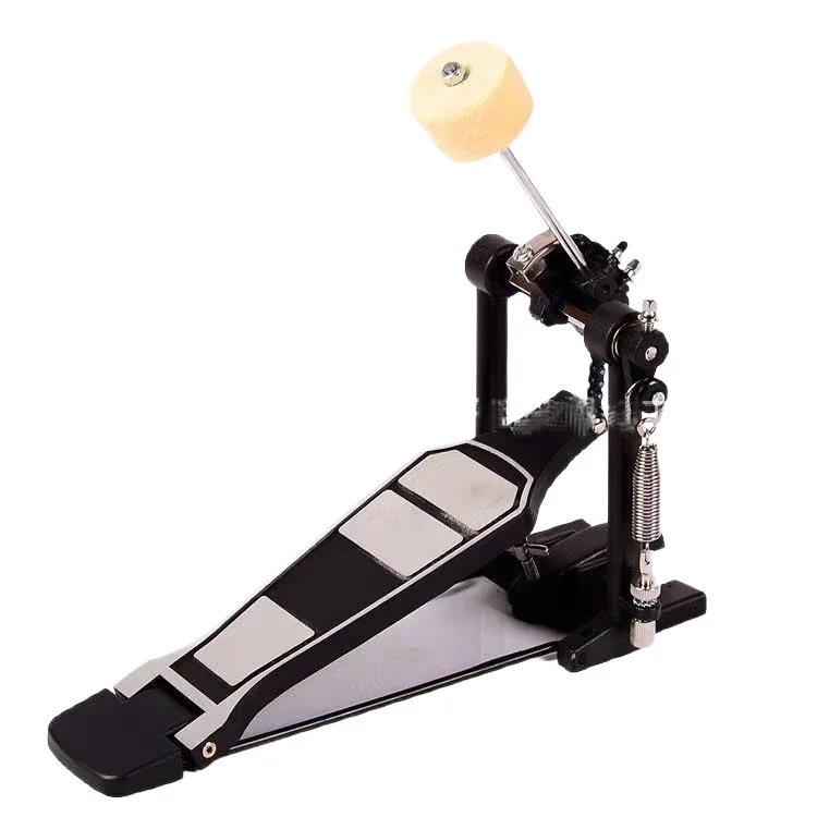Single bass drum pedal practice for drum kit: pedal, beater, foot on the bass drum