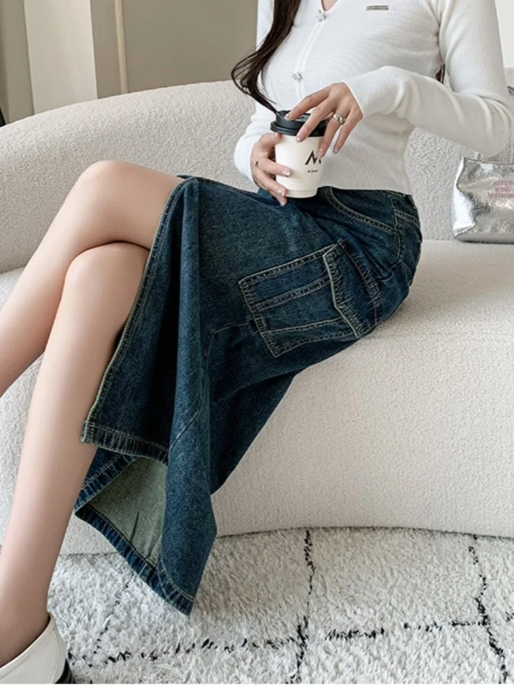 Nowa Jesienna Koreańska Wersja Casualowa Spódnica Jeansowa w Kształcie Litery A Damska Spódnica do Pracy z Wysokim Stanem, Średniej Długości, Seksownym Rozcięciem z Przodu