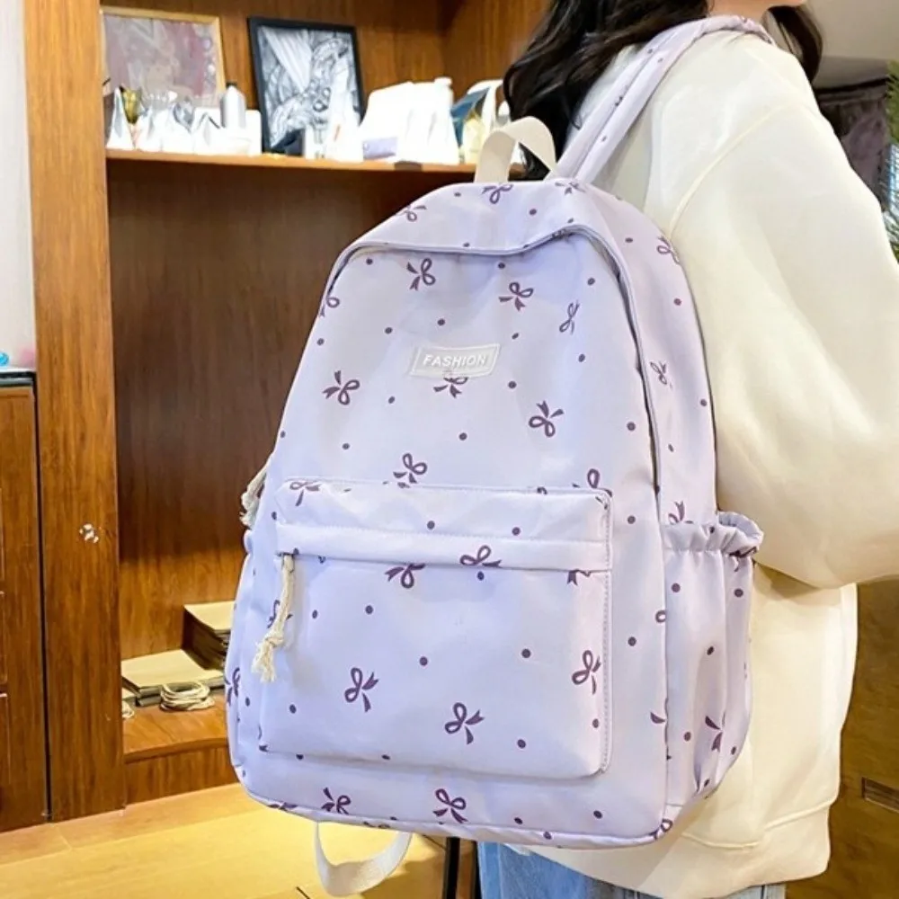 

Рюкзак из нейлона с принтом в виде банта, регулируемые лямки, множество карманов, большая вместимость, усиленная конструкция, в стиле Харадзюку