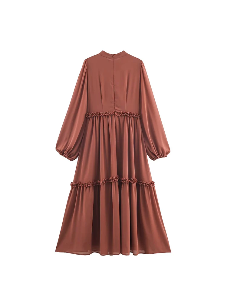 New European-style women's dress, fashionable and versatile, featuring an elegant design with ruffled details and long sleeves.