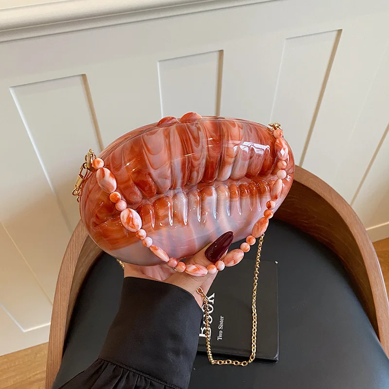 

Women's Acrylic Bionic Shell Crossbody Bag Creative Aesthetic Daily Party Dating Shoulder Bags 2026 Luxury Fashion Handbags