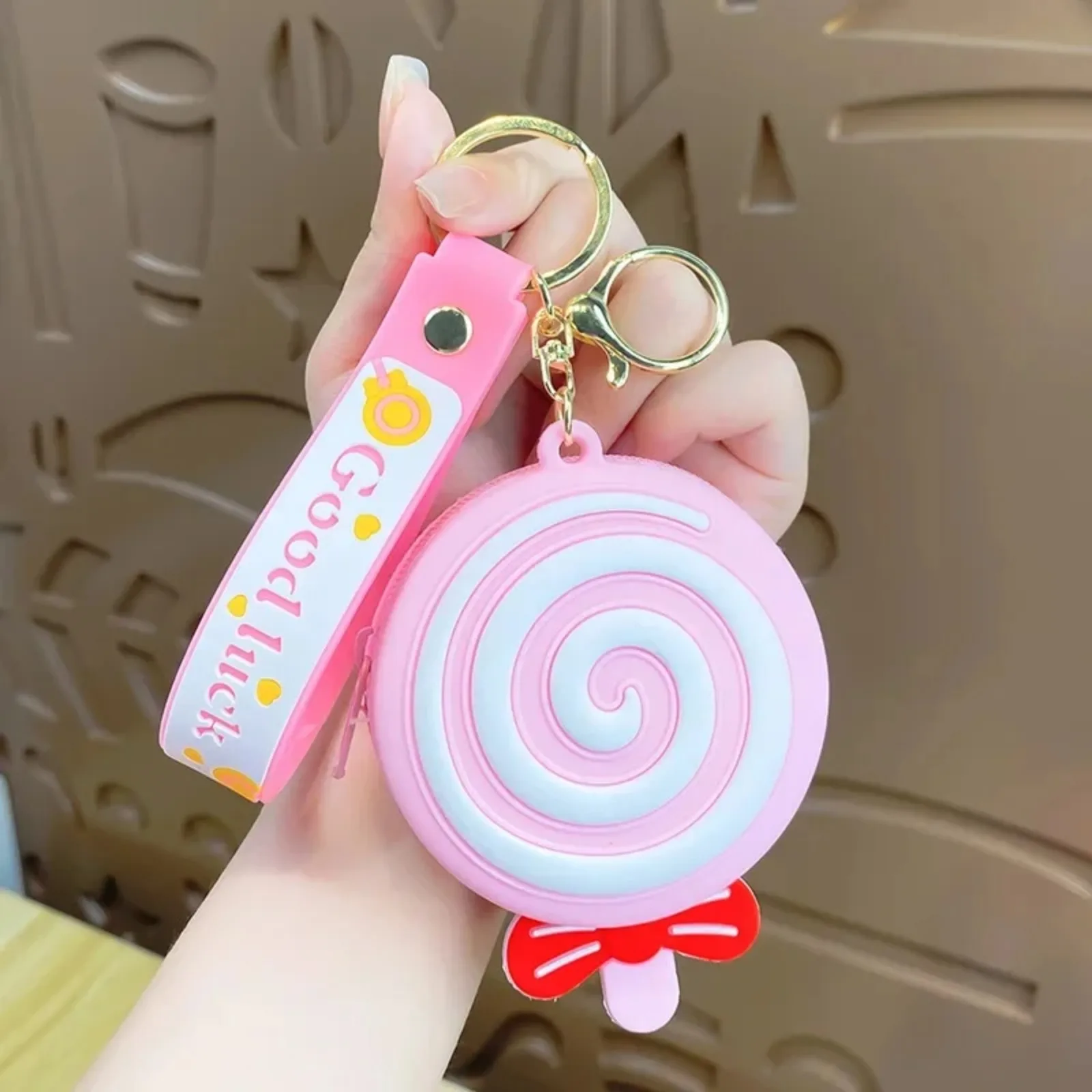 กระเป๋าใส่เหรียญซิลิโคนทรงกลมลายลูกกวาดสำหรับเด็กผู้หญิงน่ารัก กระเป๋าใส่ลูกอมขนาดเล็กพร้อมสายปรับได้