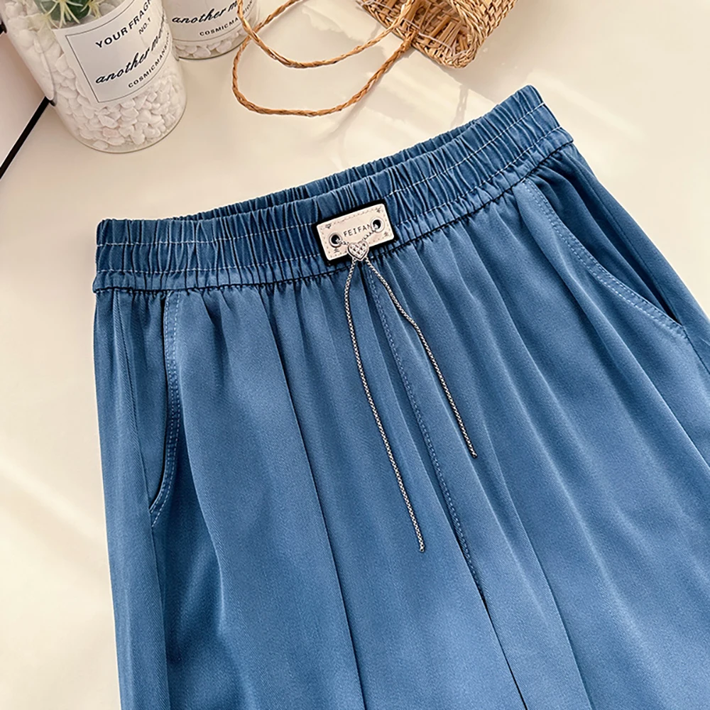 Pantalon en Denim fin et ample pour femmes, décontracté, chaînes de mode d'été, cordon de serrage, taille élastique, pantalon droit en soie glacée, jambes larges