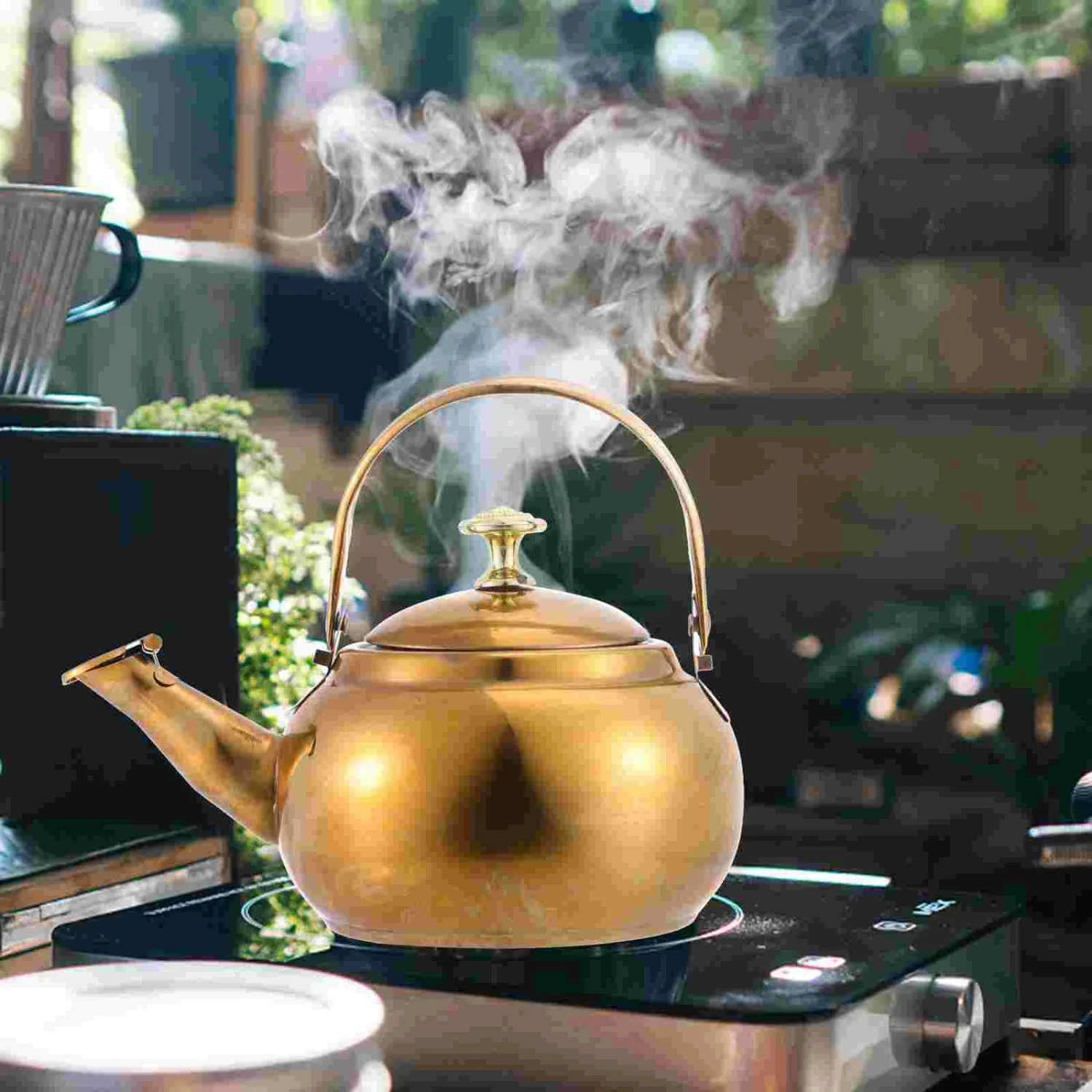 Impress guests with this chic, versatile, and durable tea kettle - a must-have addition to your kitchenware collection. Perfect 