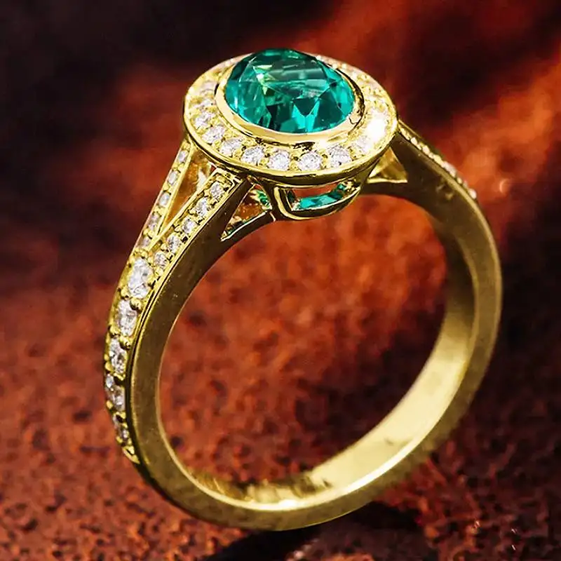 Huitan Goldfarbener Damenring mit glänzendem blauen CZ, vielseitiges Hochzeitszubehör, luxuriöser Party-Schmuck für Damen, bezaubernder Modeschmuck