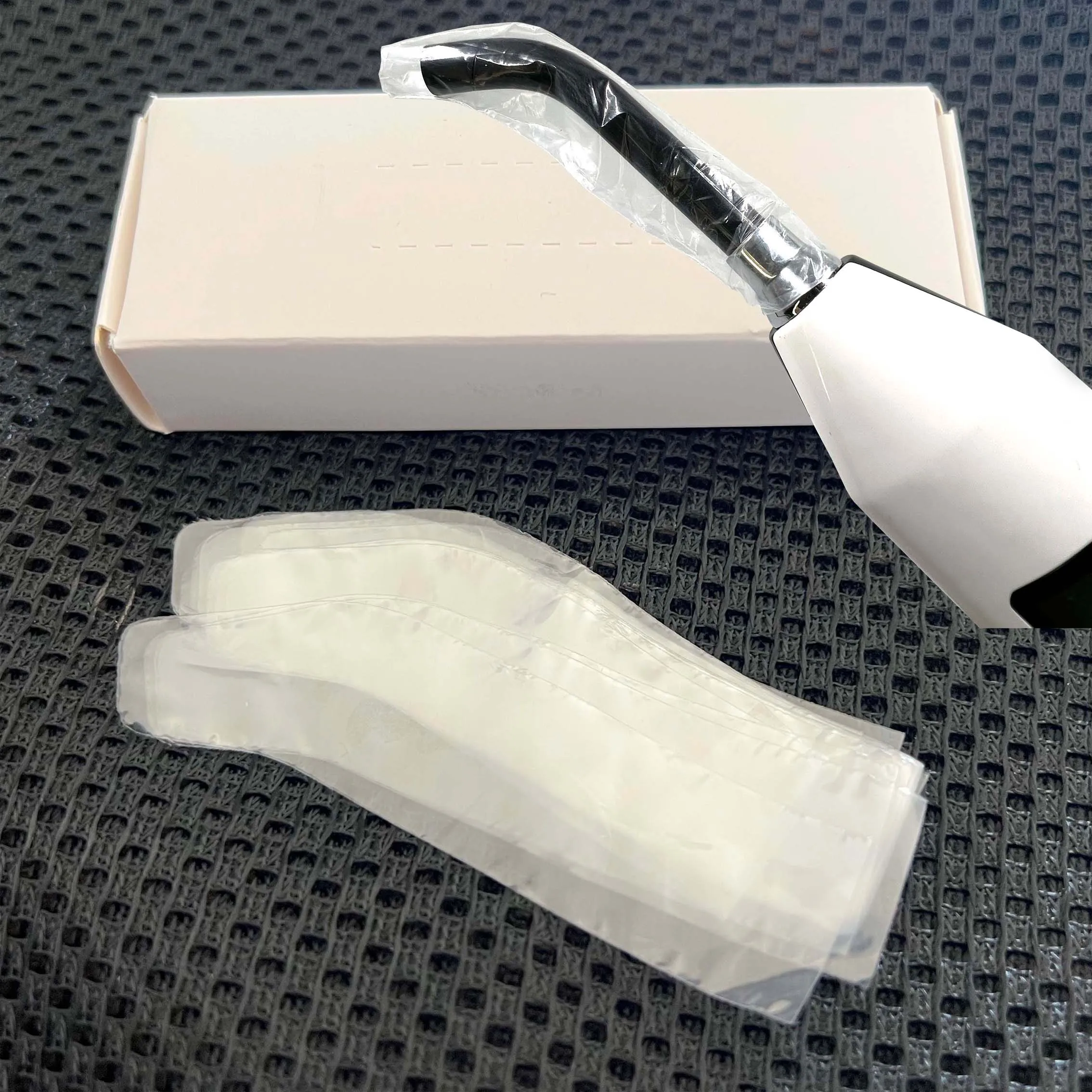 

200pcs/Box DENTAL Disposable Plastic LED Curing Light Guide Sleeve Dental Light Curing Head Covers Protective Film 8*2cm