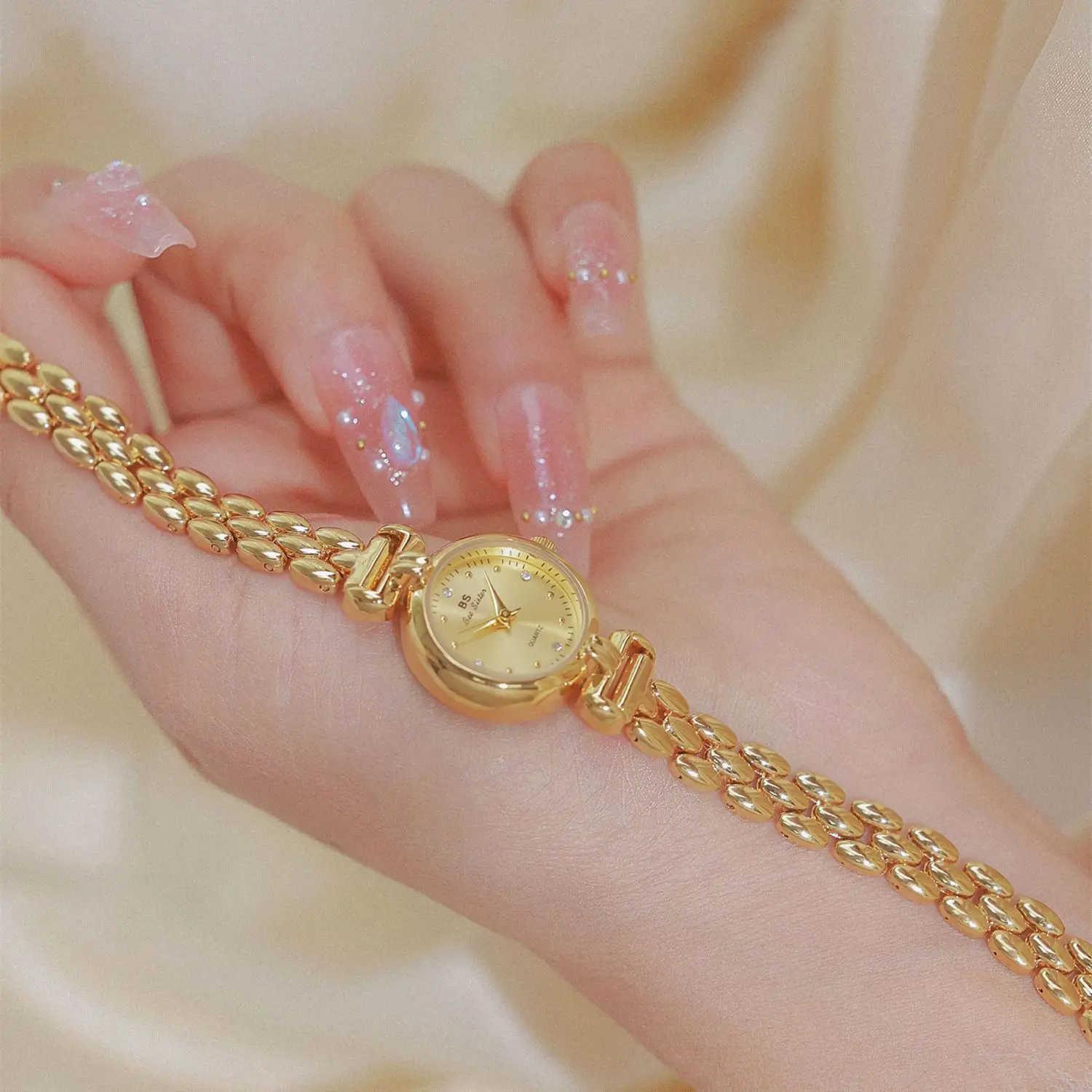 

BS light luxury hot-selling factory direct sales foreign trade simple retro gold and silver watch hand small linked list tempera