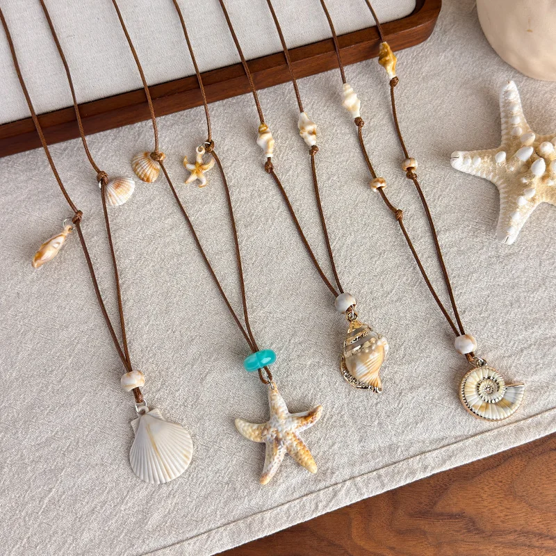 2026 Sommer Bohemian Seestern Muschel Perlen Anhänger Lange Seil-Halskette für Damen Trendiger Strand Urlaub Schmuck Accessoires