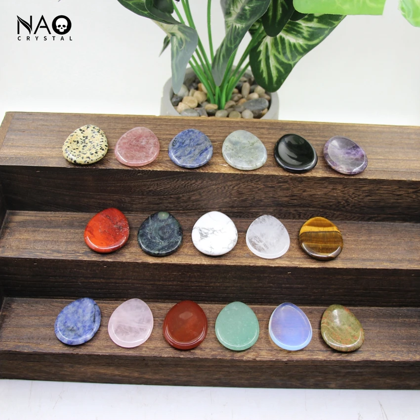 Кварцевый массажный камень в виде капли, 35x45 мм Кварцевый массажный камень в виде капли, 35x45 мм