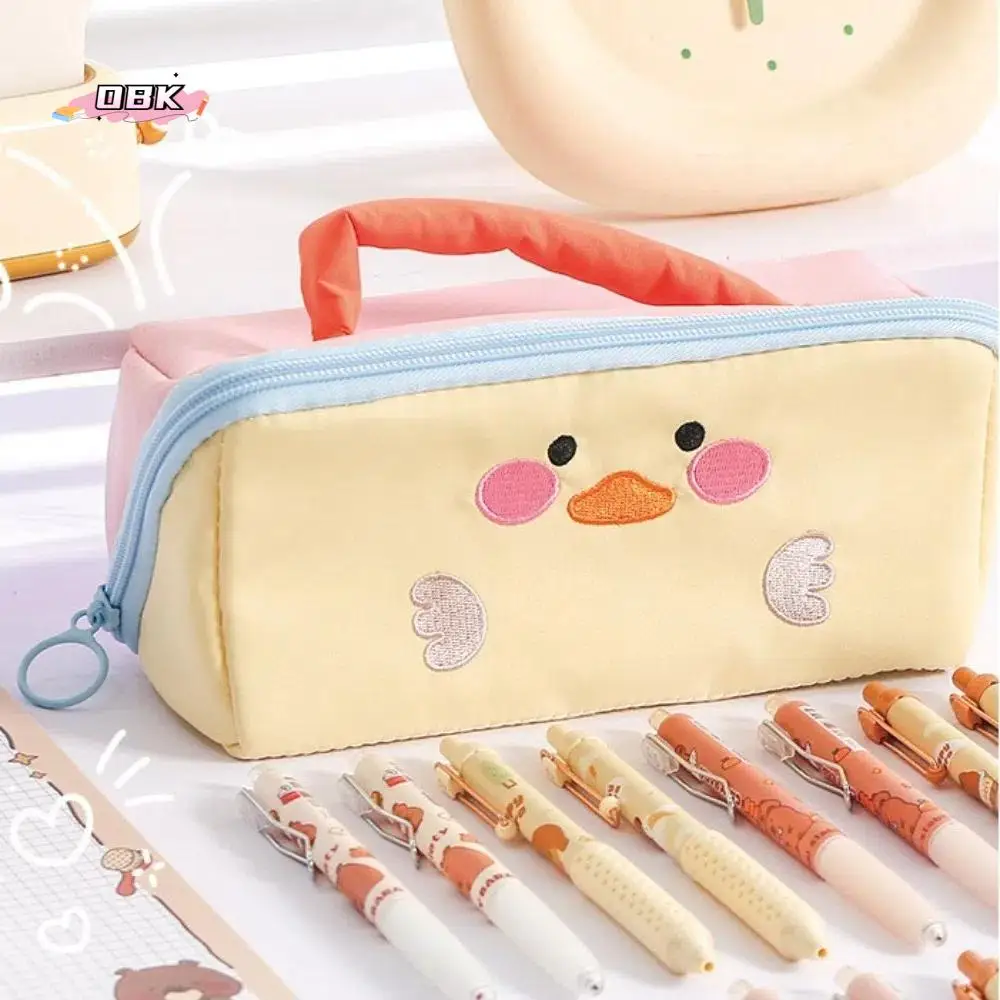 

Large Capacity Cartoon Pencil Case Cosmetics Storage Duck Rabbit Dinosaur Korean Pencil Bag Portable Zipper Makeup Bag