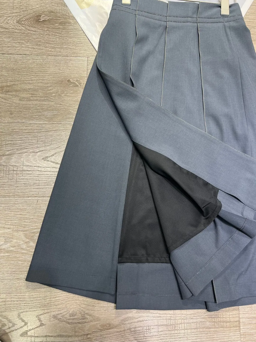 High quality equivalently trimmed A shaped skirt