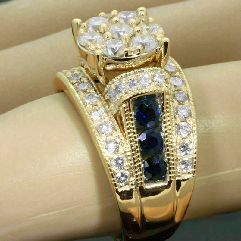 Huitan edle blaue Zirkonia Frauen Ringe Luxus Gold Farbe Finger Accessoires für Hochzeitstag Party Modeschmuck