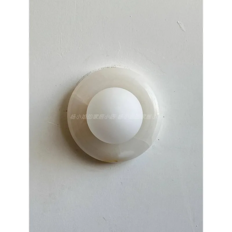 

French wabi sandy wind natural marble wall lamp model room hotel living room lamp bedroom bedside wall lamp aisle
