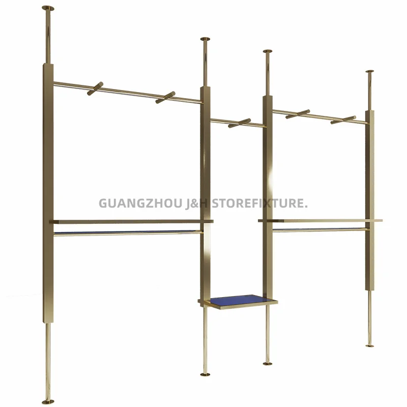 ราวแขวนเสื้อผ้าติดผนังแบบกำหนดเอง สำหรับร้านขายเสื้อผ้าผู้หญิง ทำจากสแตนเลสสตีลสีทองไทเทเนียม