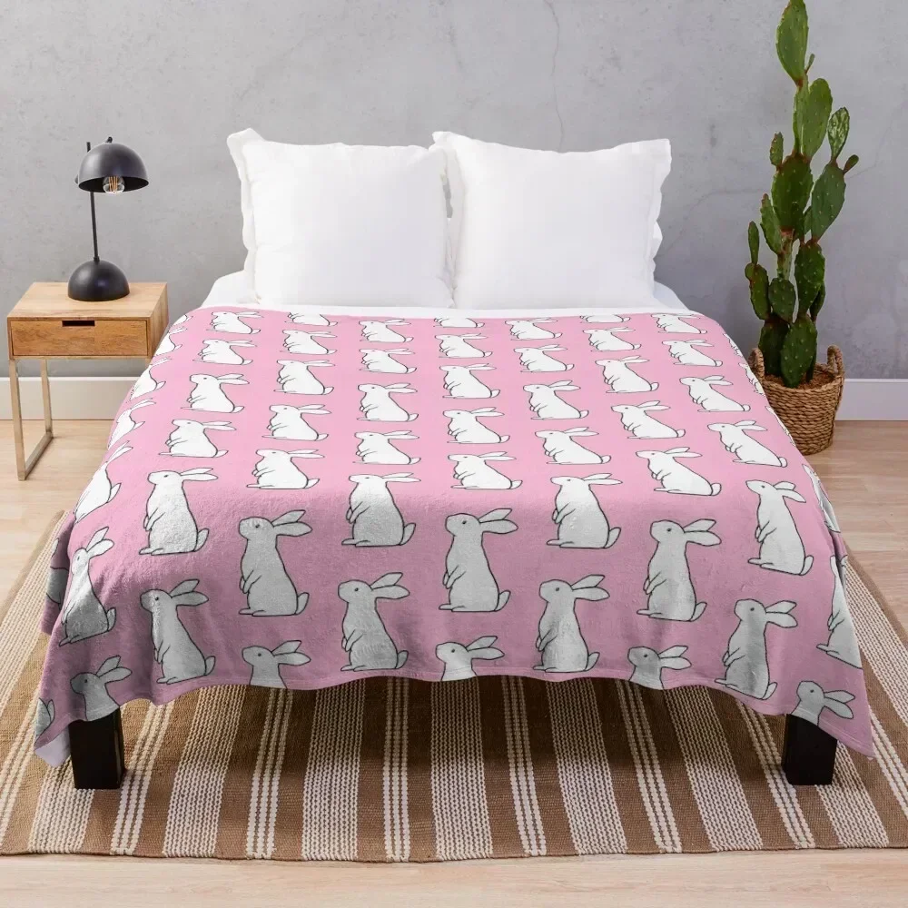 

Simple rabbit - white with pink background Throw Blanket