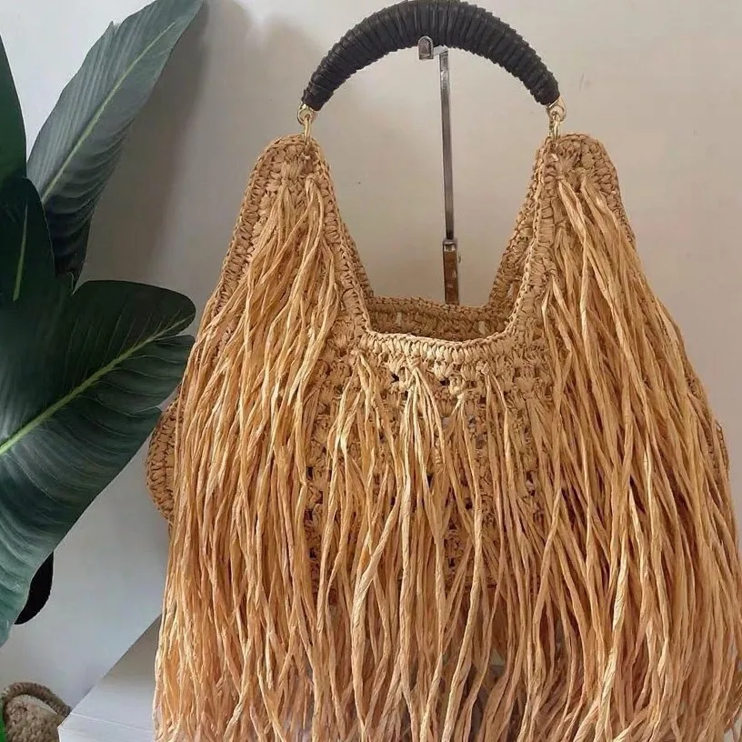 

Hollow Out Tote Bags For Women Luxury Designer Handbag Purse New Weave Large Capacity Tassel Shoulder Straw Beach Bag