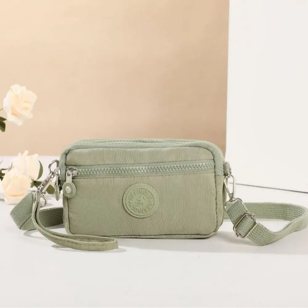

Simple Double-layer Zipper Crossbody Bag Niche Design Korean Style Shoulder Bag Nylon Solid Color Small Phone Bag Cosmetic Bag