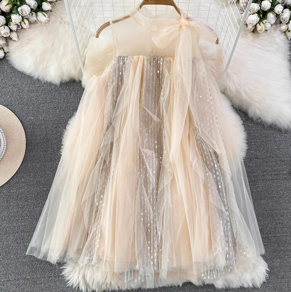 أنيقة الفرنسية فضفاضة الجولة الرقبة بلا أكمام الحلو لطيف فستان جنية 2025 صيف جديد مطرزة ألف خط الشاش فساتين المشمش الكورية