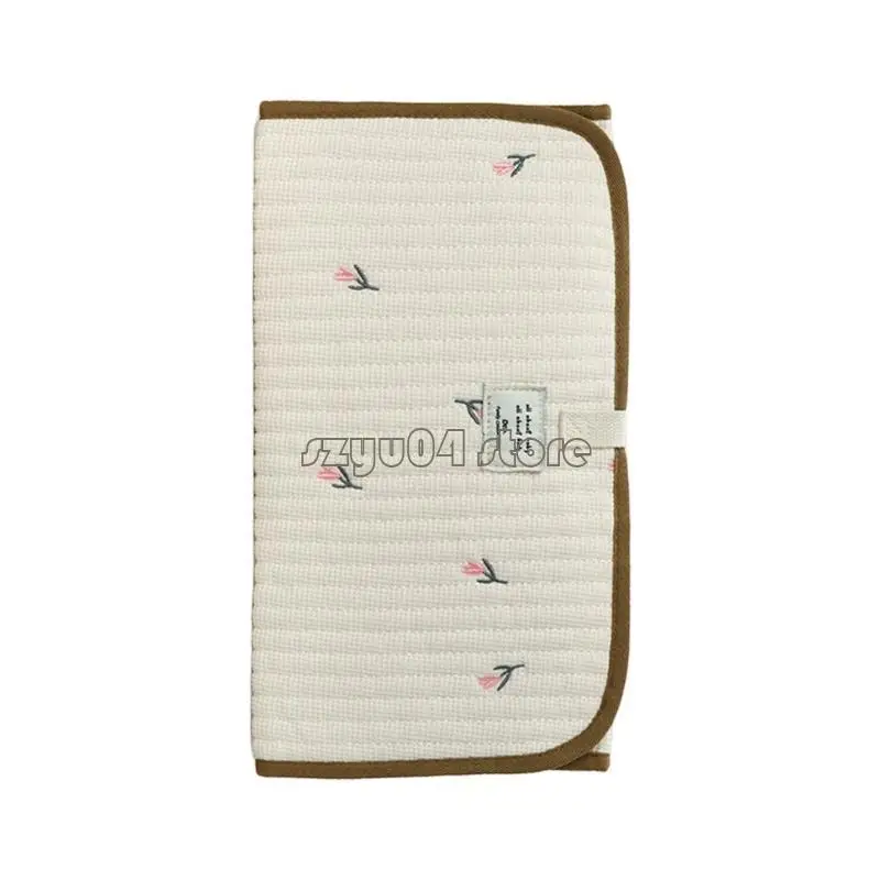 4x7d Leichtes tragbares Babywechseltabellanbaus mit integrierten Aufbewahrungstaschen und komfortablen Designs