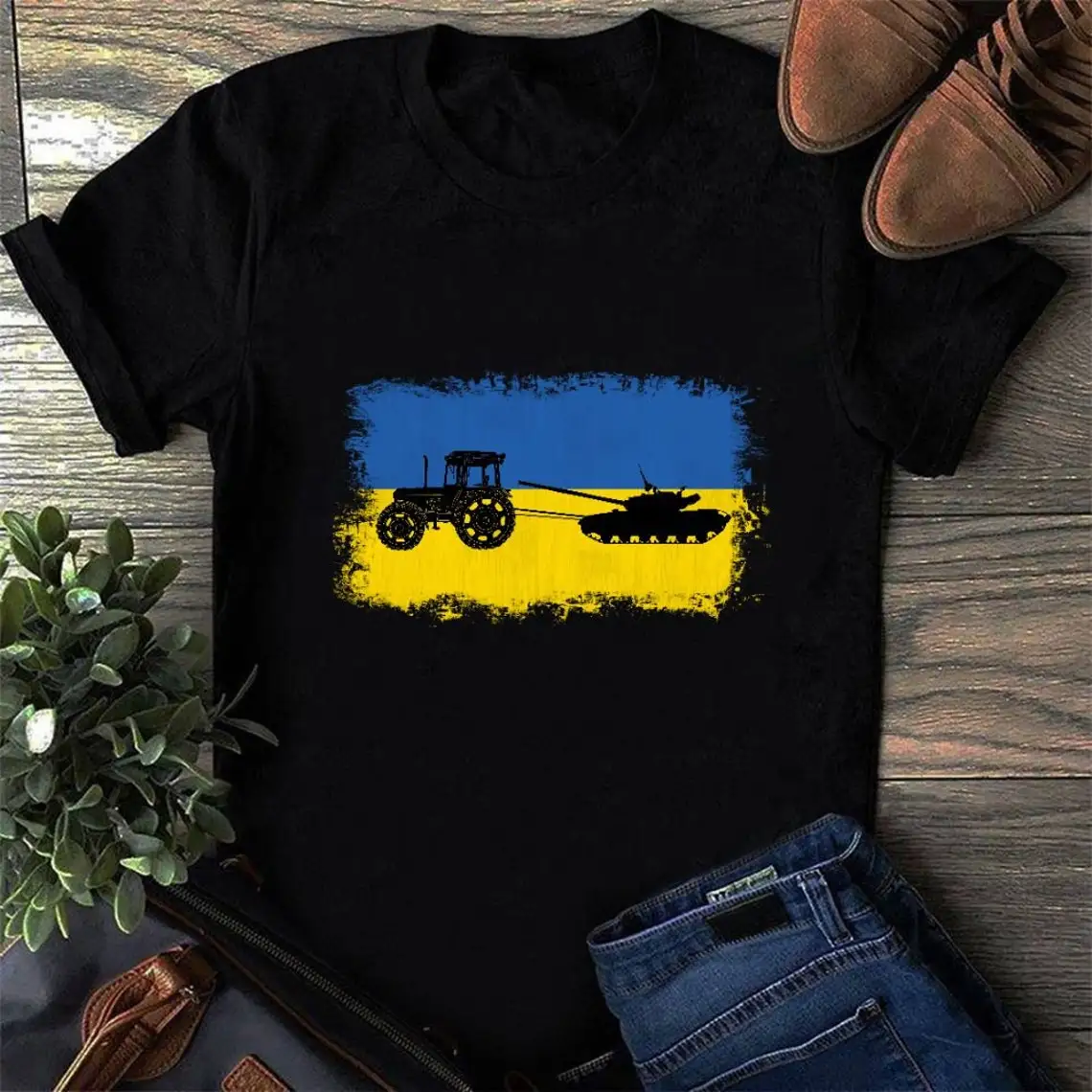 

Ukrainian Farmer Tractor Steals Tank. Proud Ukrainian Flag T Shirt. Short Sleeve 100% Cotton Casual T-shirt Loose Top Size S-3XL